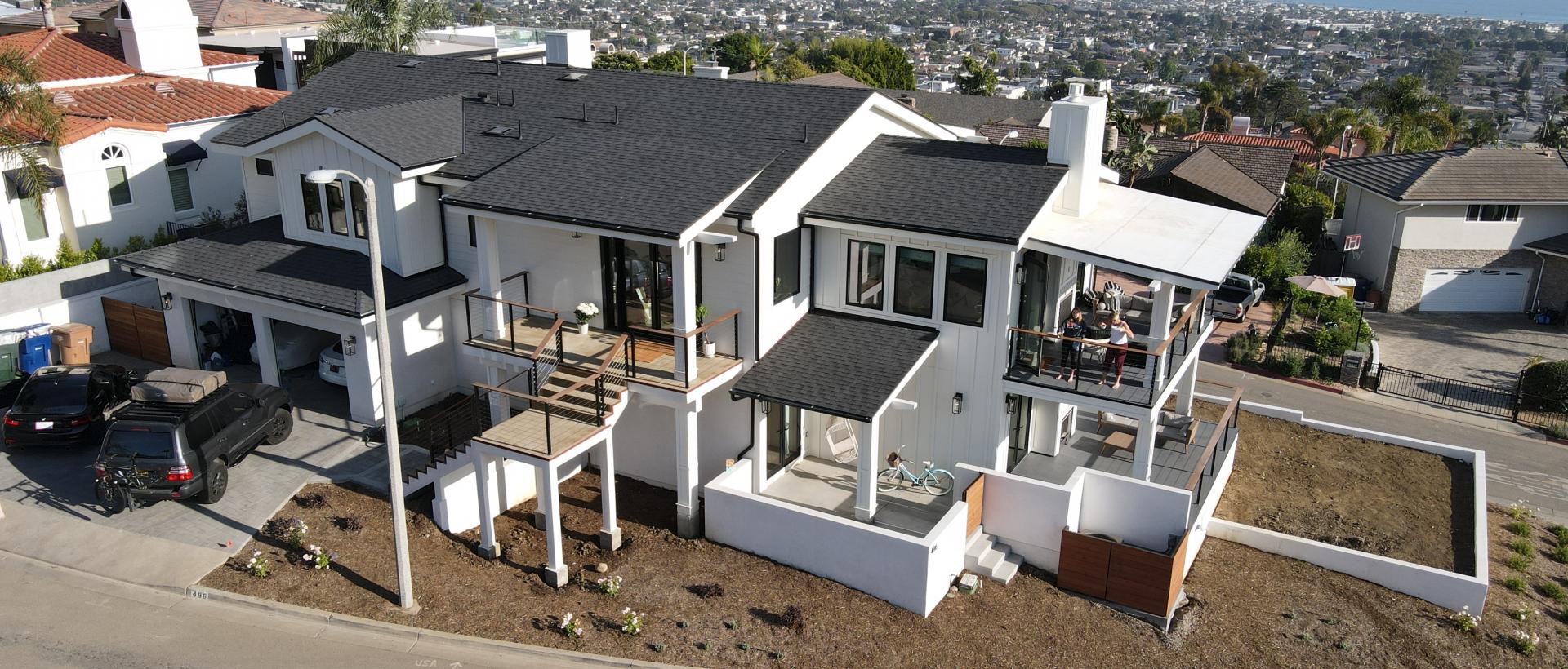 Miller Residence alternate aerial view of the front and right side of the house